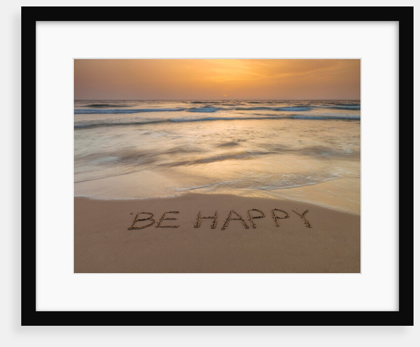 Sand writing on beach by Assaf Frank